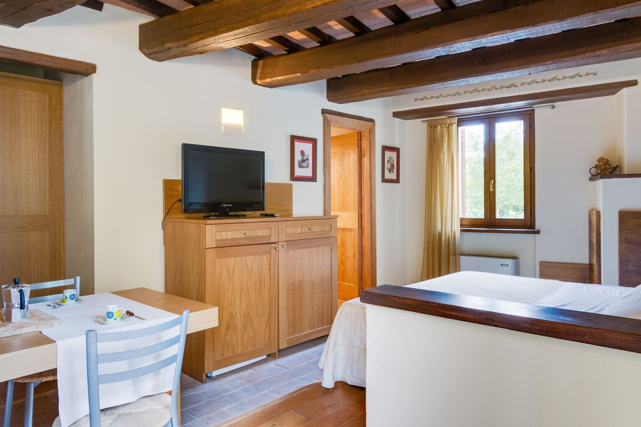 Heavenly Holiday Home in Folignio with Whirlpool