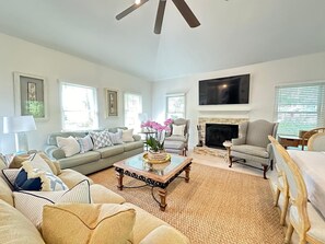 Smart TV, fireplace, books