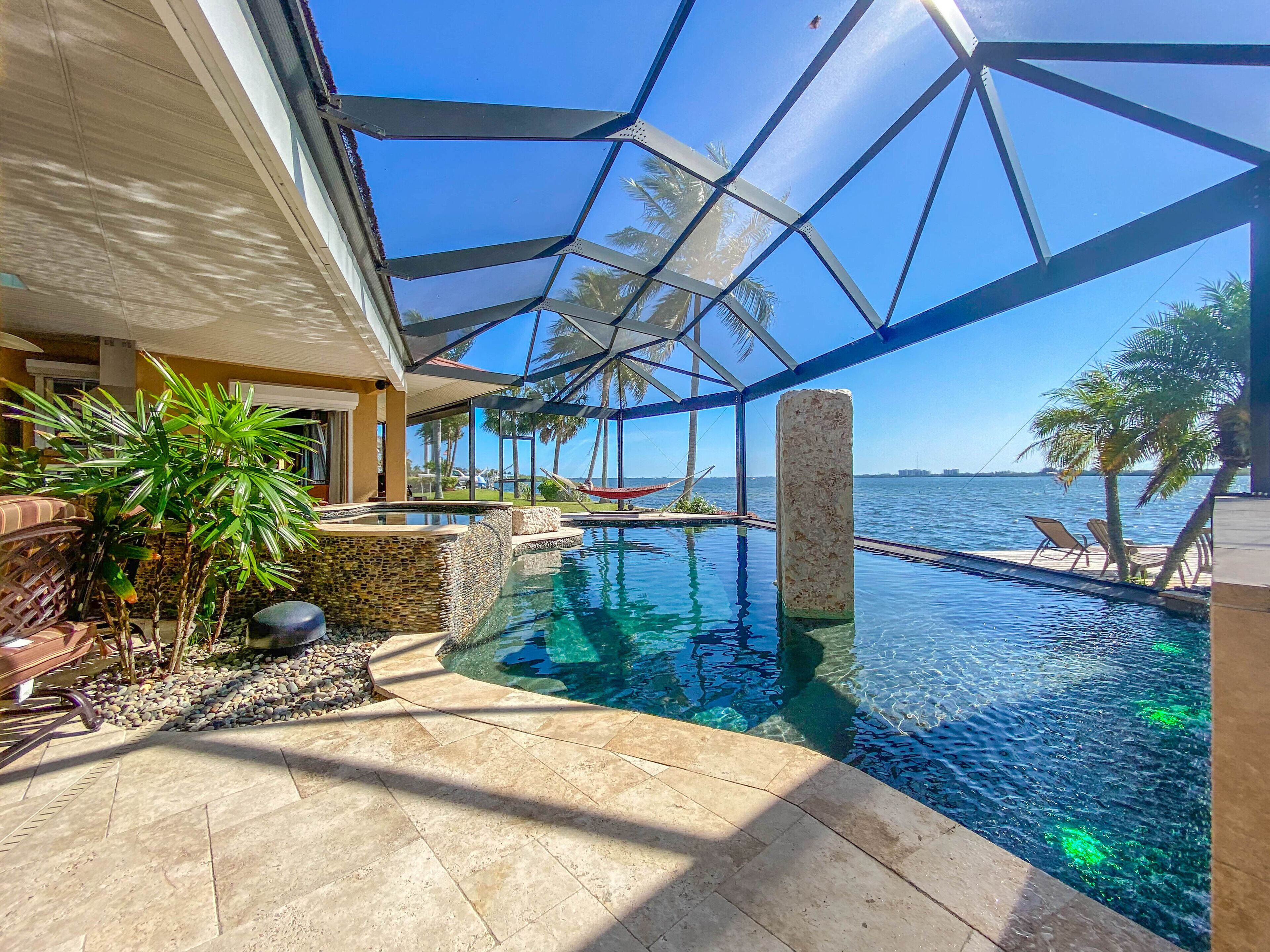 Paradise on the Bay - Snead Island FL Waterfront - pool featured on Insane Pools