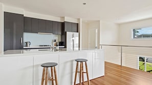 Dishwasher, coffee/tea maker, dining tables