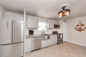 Fridge, microwave, oven, stovetop - Pet-Friendly Island Loft near Beach & Nightlife (Galveston)