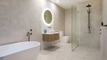 Bathtub, hair dryer, towels