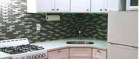 Refrigerador, microondas, horno, placa de cocina