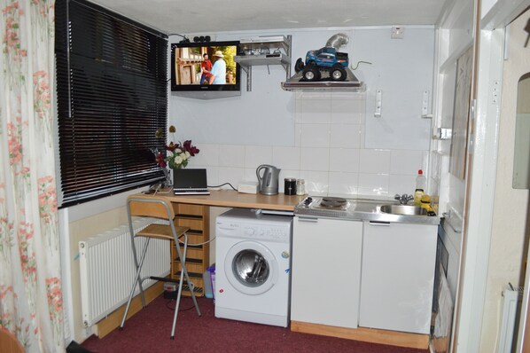 Fridge, microwave, electric kettle, toaster