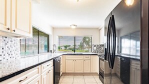 Coffee/tea maker, fridge, microwave, oven - Waterfront Family Home Away From Home with Hot Tub Near Beaches and Parks! (Holiday)