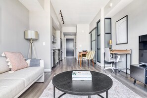 TV, stereo - Roomy Navy Yard 1BR w/ W/D, Roof BBQ & Gym, near Nats Park by Blueground (Washington, D.C.)