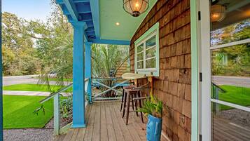 Step out onto the porch and enjoy the serene surroundings.