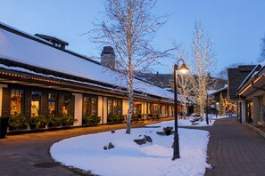 Stroll through the charming streets lined with twinkling lights and cozy outdoor seating areas.