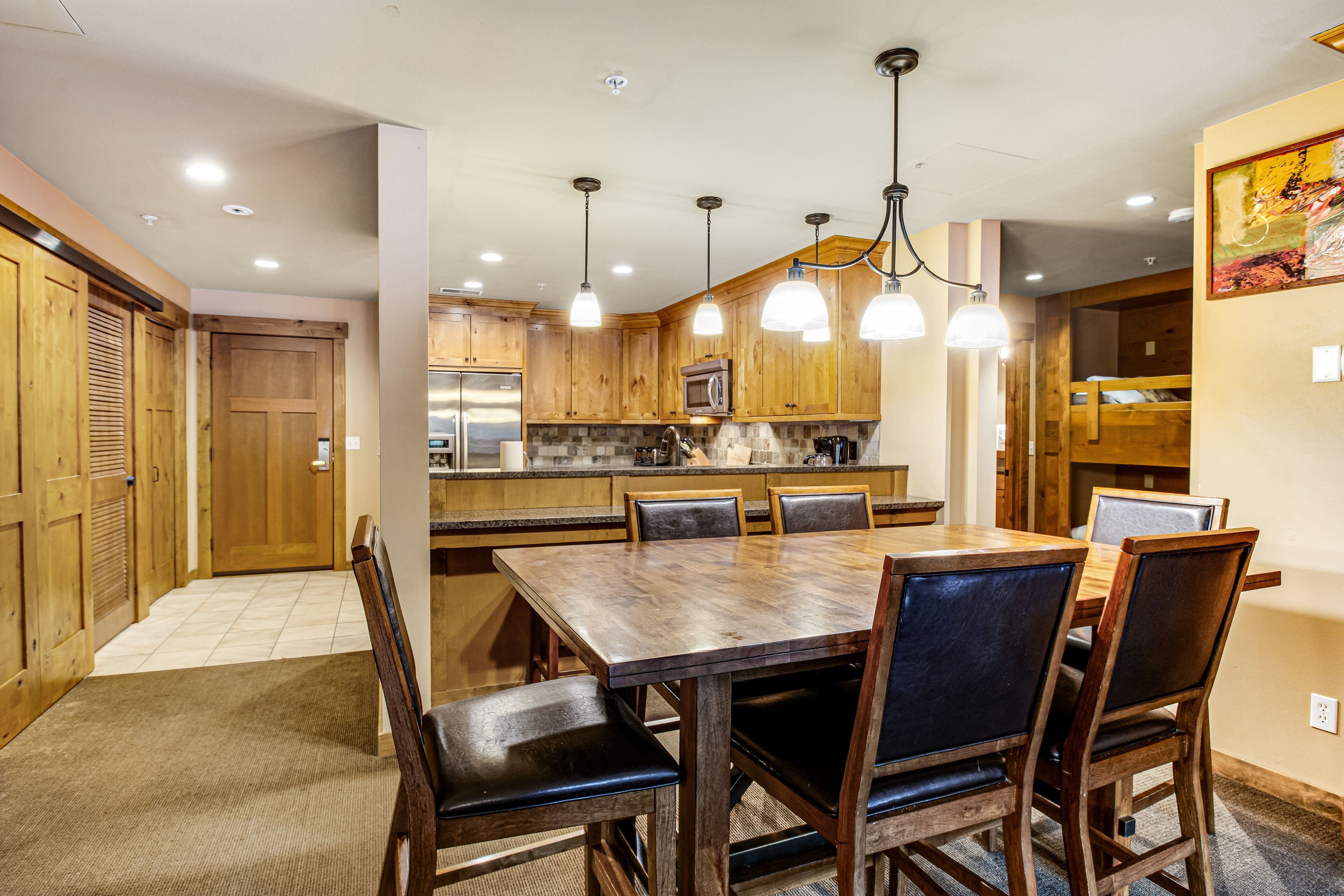 Year-round outdoor getaway with shared pool, private patio, full kitchen & WiFi