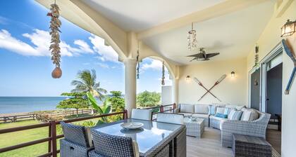 Ocean view beachfront condo w/ pool access, WiFi, and private BBQ grill