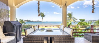 Ocean view beachfront condo w/ pool access, WiFi, and private BBQ grill