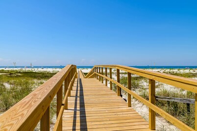 Newly renovated waterfront condo with pool, WiFi, W/D, & central AC
