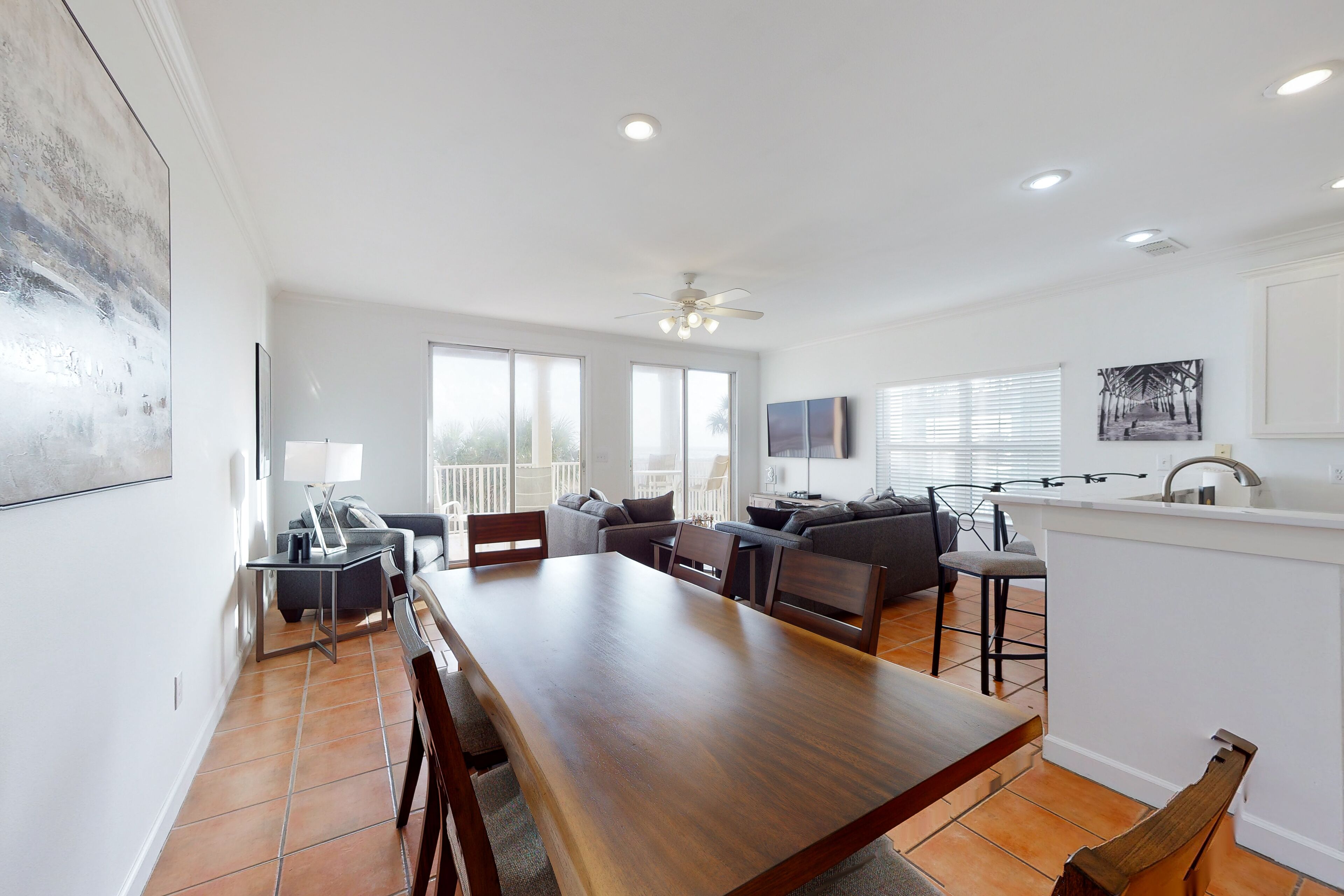 Newly renovated waterfront condo with pool, WiFi, W/D, & central AC