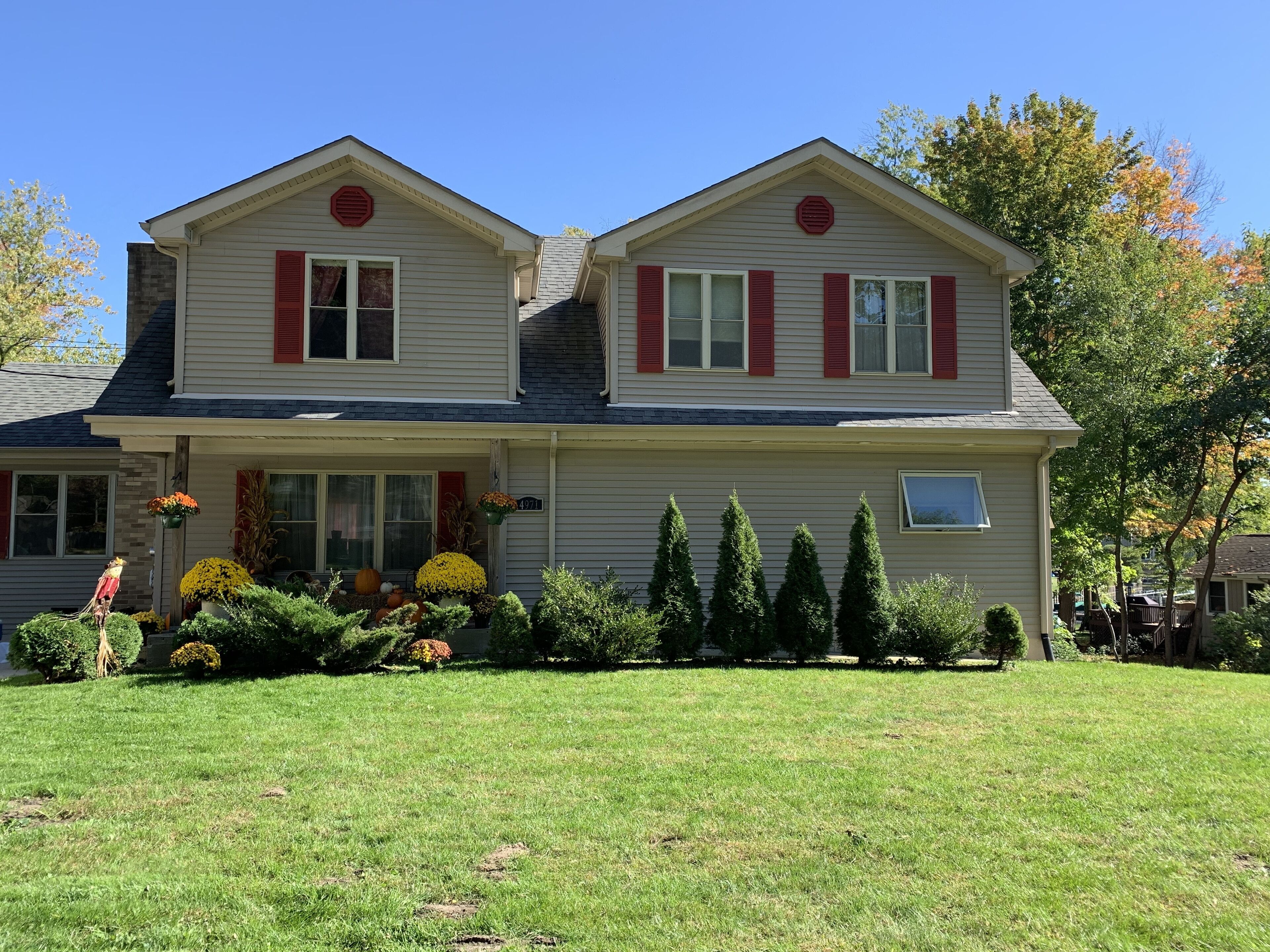 Award-winning lake house on all-sports Paw Paw Lake with private boat slip 