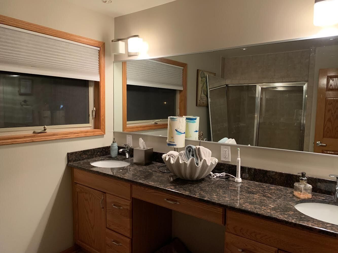 Award-winning lake house on all-sports Paw Paw Lake with private boat slip 