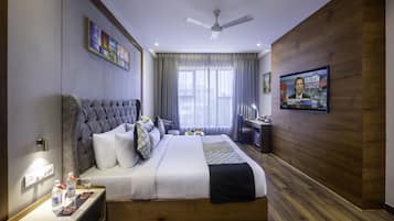 Habitación ejecutiva | Minibar, camas supletorias, wifi gratis y ropa de cama