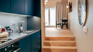 Studio Deluxe | Literie de qualité, espace de travail pour ordinateurs portables