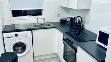 Comfort Apartment | Private kitchen | Full-size fridge