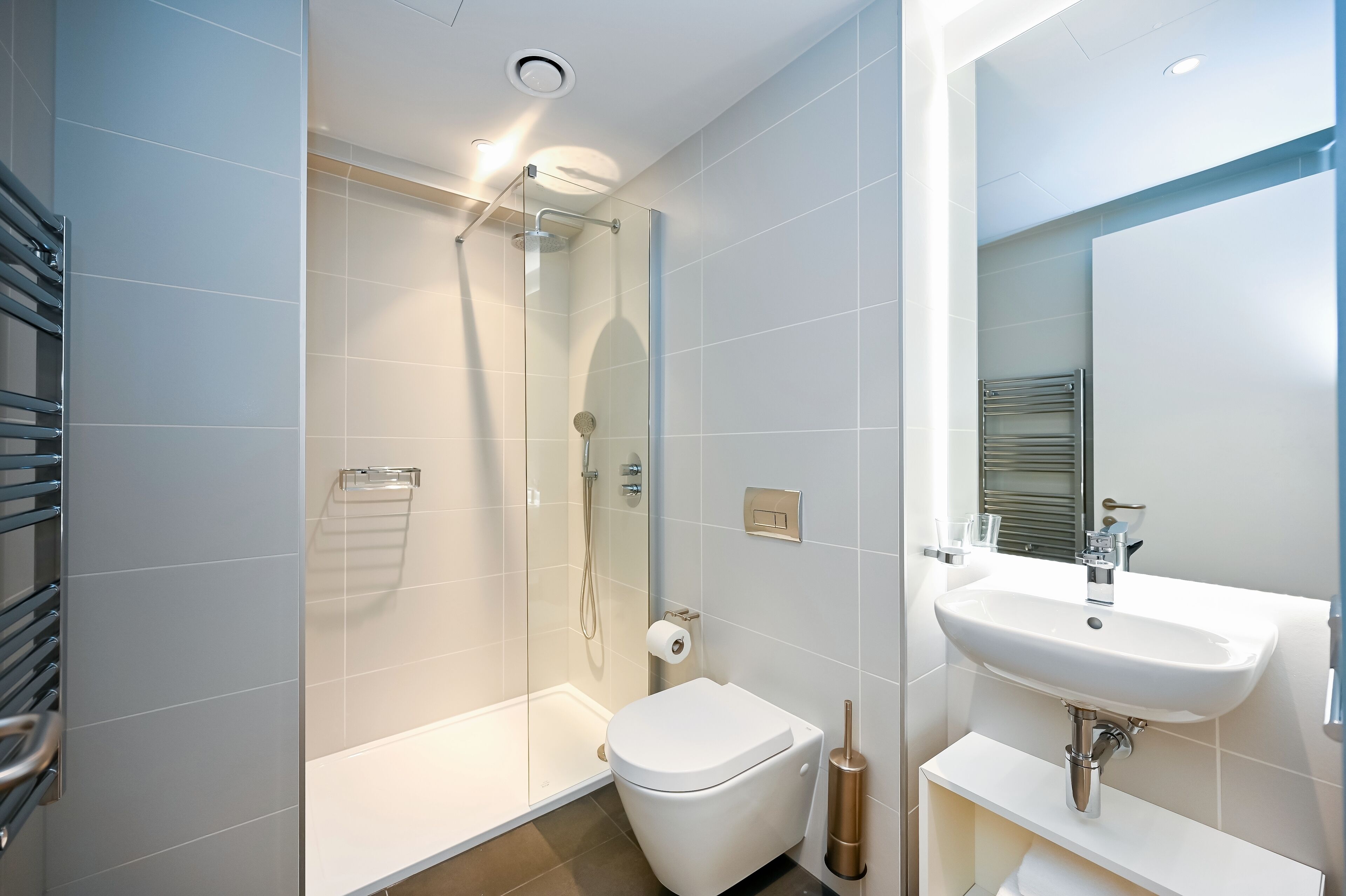 1 bedroom apartment twin | bathroom | shower, rainfall showerhead, hair dryer, towels