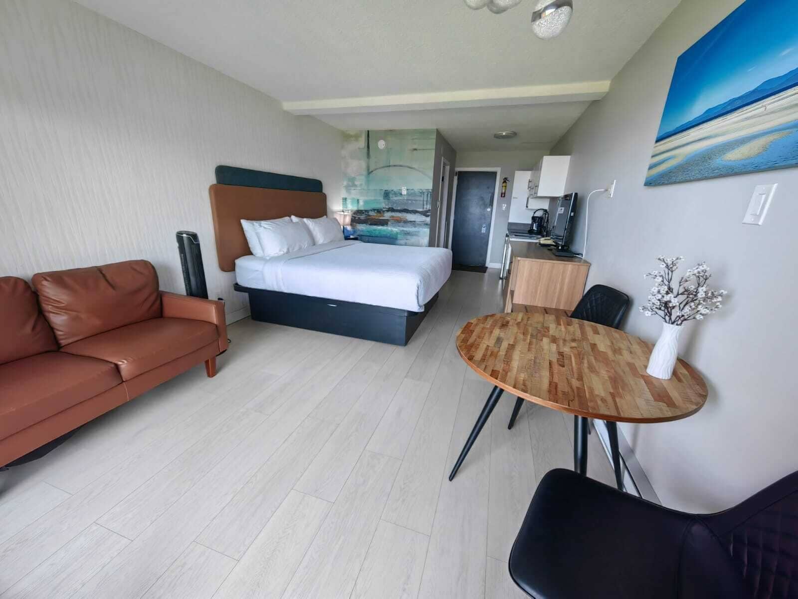 Oceanview King Room w/ Kitchenette | Desk, laptop workspace, blackout drapes, iron/ironing board