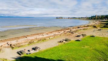 On the beach, beach towels, beach volleyball