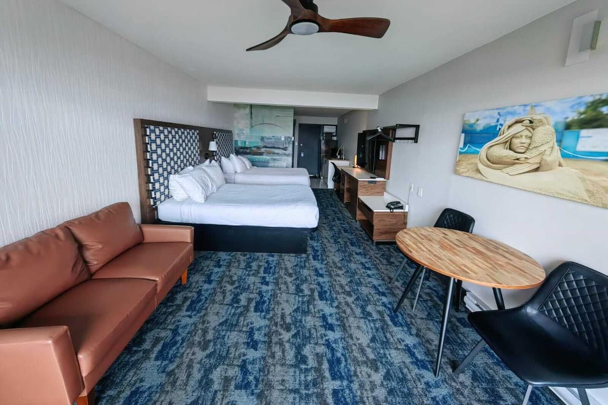 Desk, laptop workspace, blackout drapes, iron/ironing board