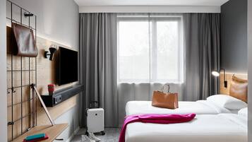 Habitación, 2 camas individuales, no fumadores | Escritorio, cortinas opacas, sistema de insonorización y cunas gratuitas