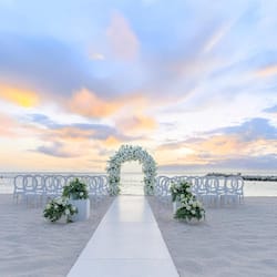 On the beach, white sand, free beach cabanas, sun loungers