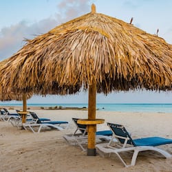 On the beach, white sand, free beach cabanas, sun loungers