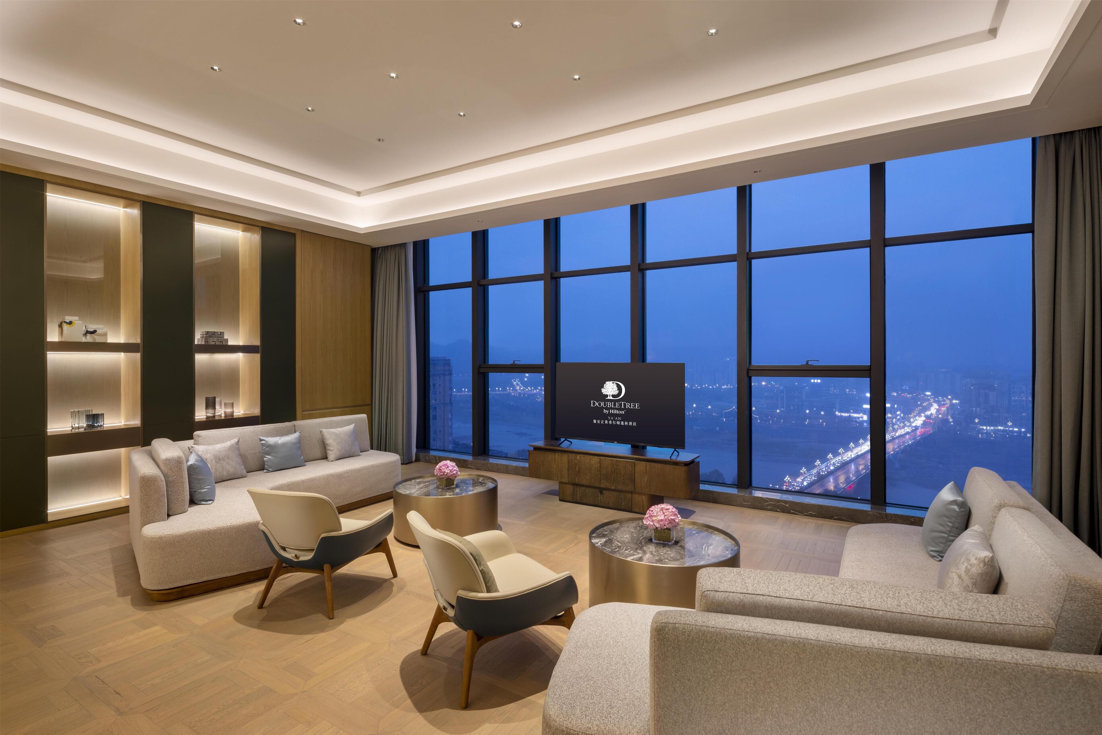 Presidential Suite, 1 King Bed | Living area | 55-inch LCD TV with cable channels