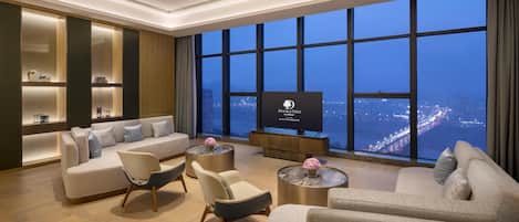 Presidential Suite, 1 King Bed | Living area | 55-inch LCD TV with cable channels