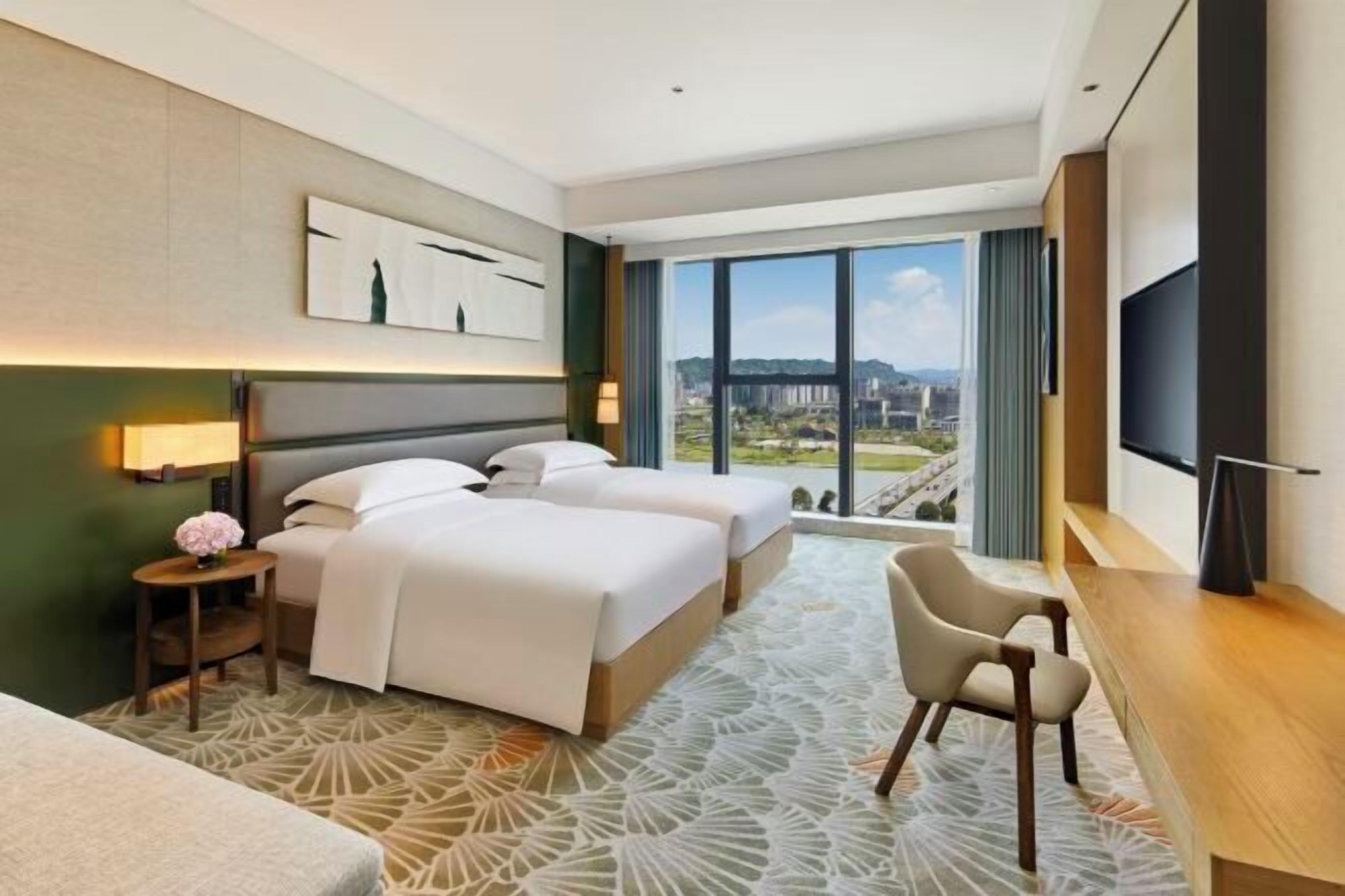 Down comforters, in-room safe, laptop workspace, blackout drapes