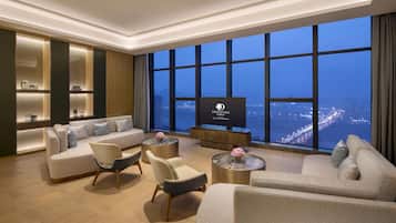 Presidential Suite, 1 King Bed | Living area | 55-inch LCD TV with cable channels