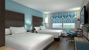 A hotel room with two beds, a desk, a chair, a TV, and a window with a view. - Tru by Hilton Chesterfield Township Detroit (New Baltimore)