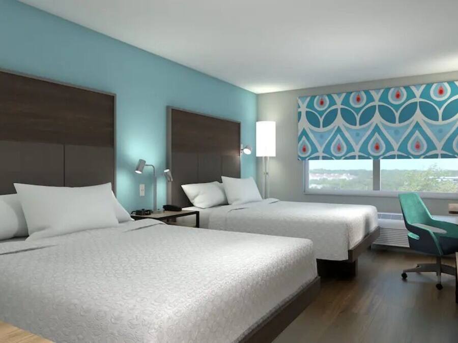 Room, 2 Queen Beds | Blackout drapes, iron/ironing board, travel crib, free WiFi