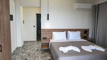 Suite, Balcony, City View | Blackout drapes, free WiFi, bed sheets
