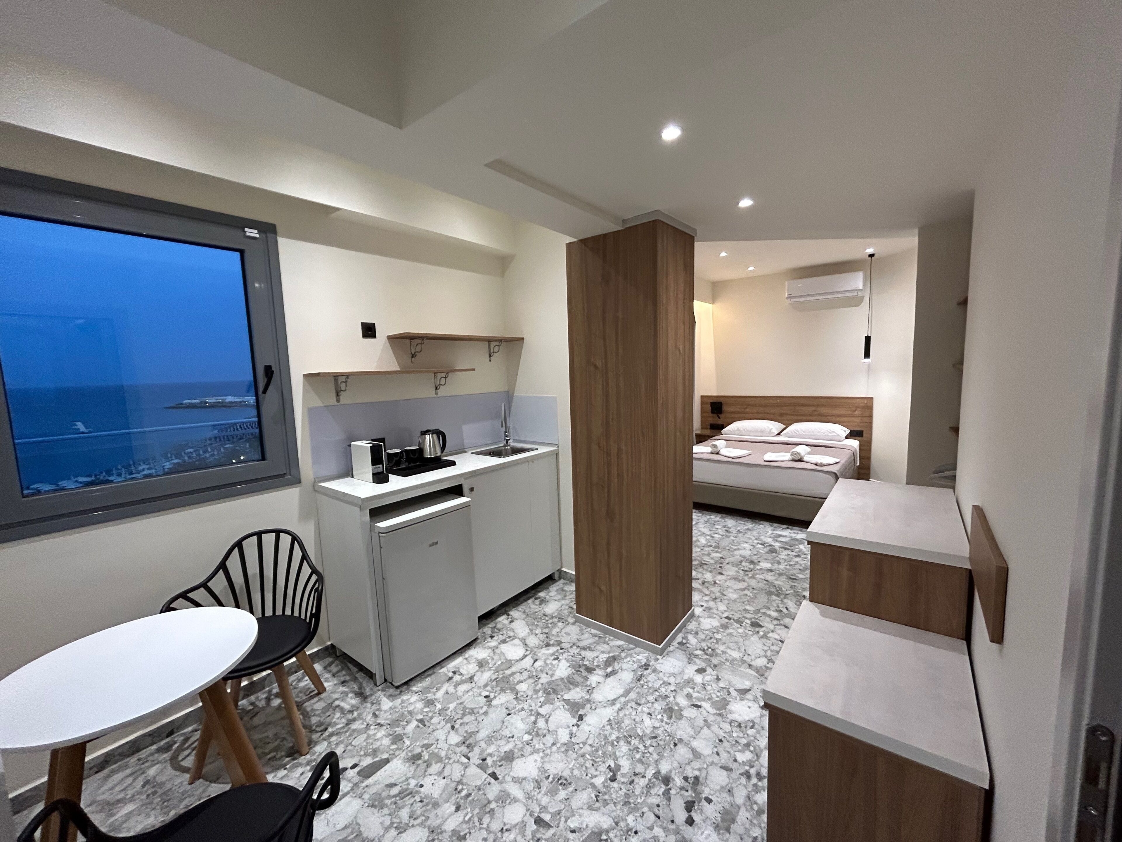 Suite, Balcony, City View | Blackout drapes, free WiFi