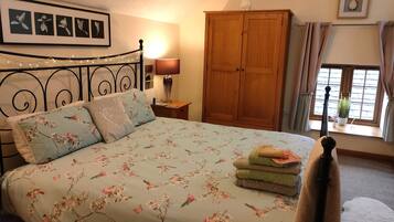 1 bedroom, desk, iron/ironing board, travel crib