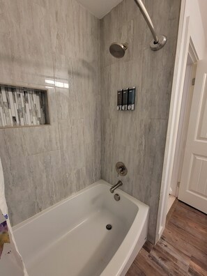 Combined shower/tub, hair dryer, towels, soap