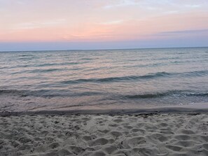 On the beach, sun-loungers, beach towels