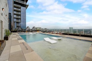 A rooftop pool, a heated pool