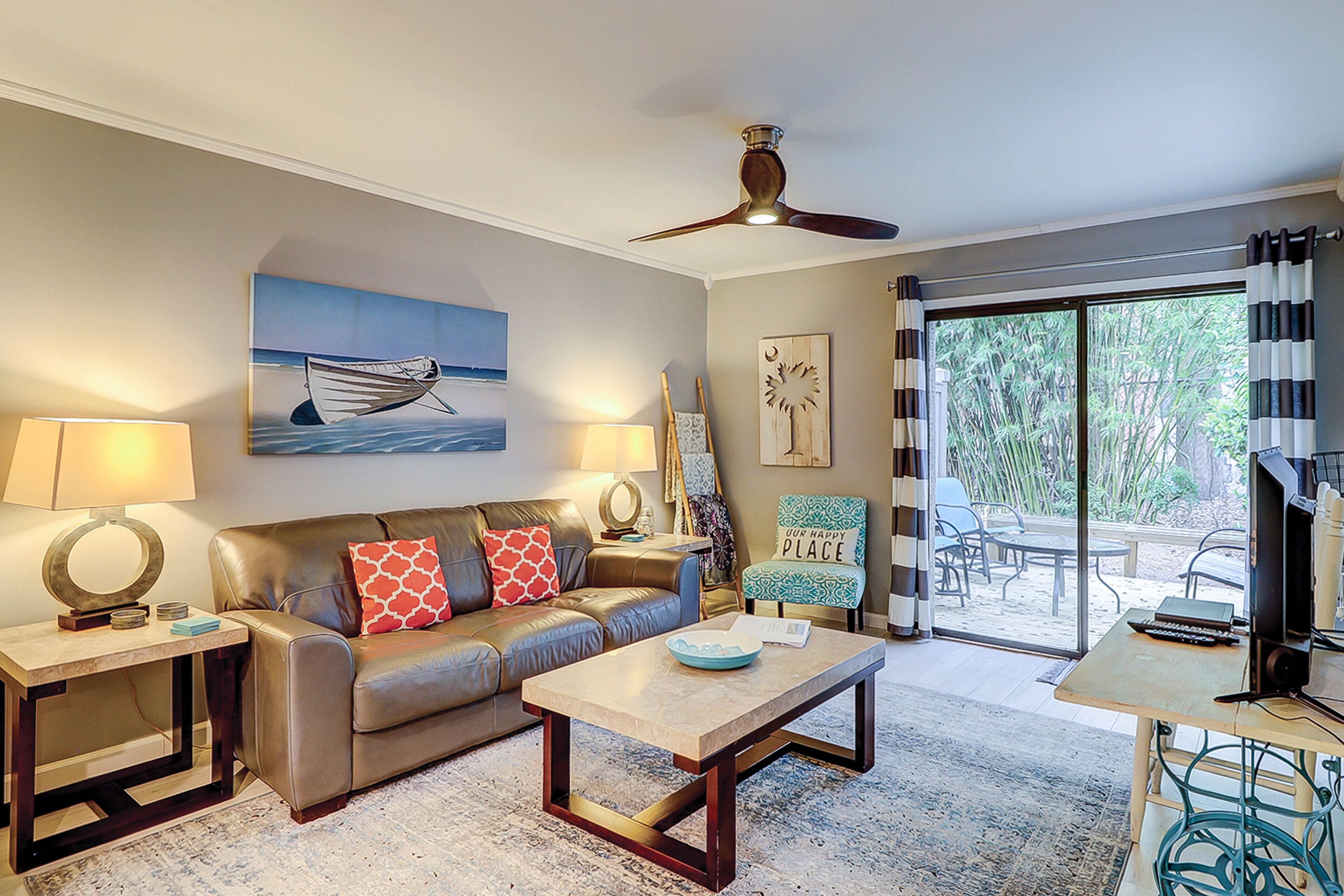 Updated condo with patio, shared pool, and WiFi - walk to Folly Field Beach Park