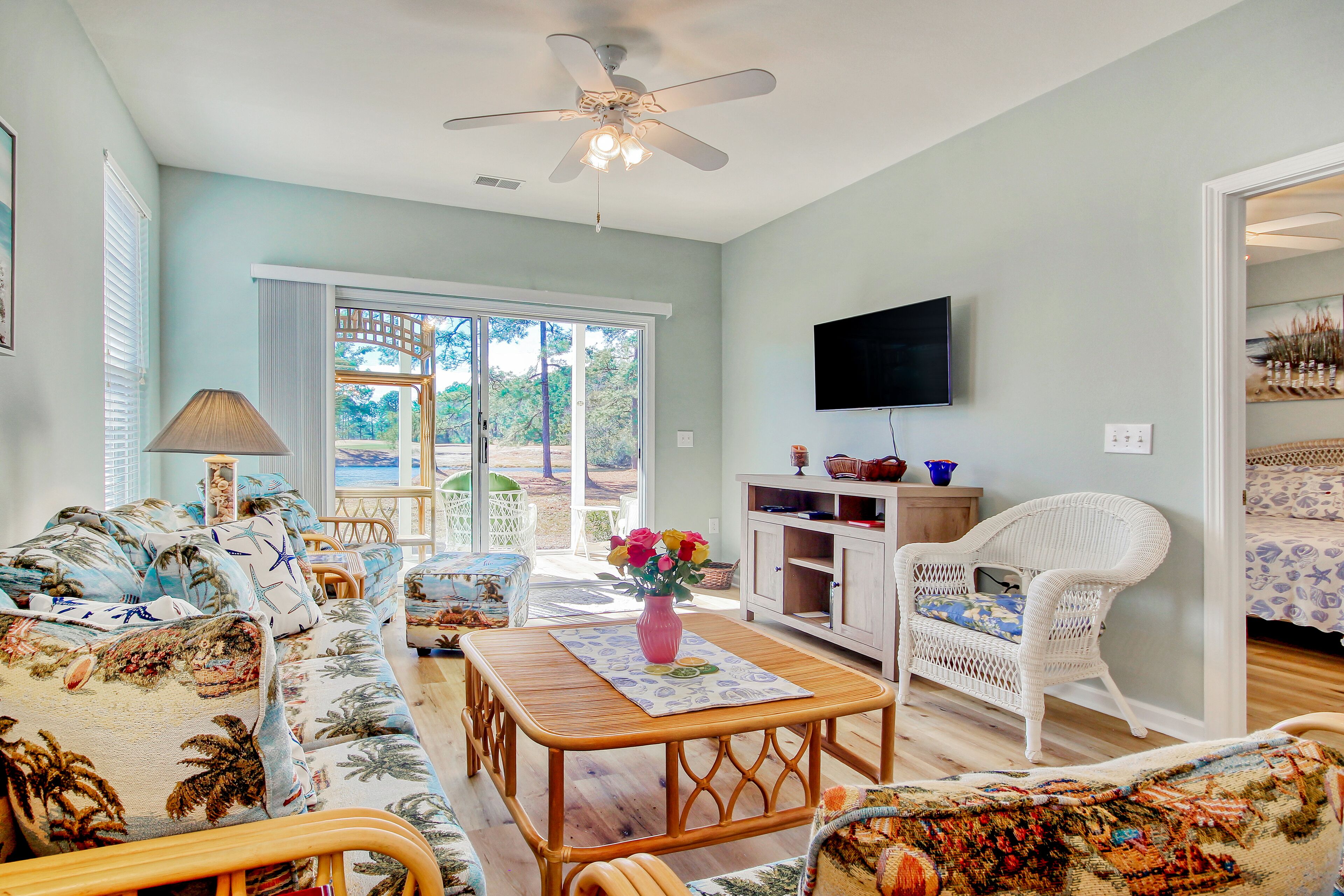 Dreamy lakefront condo near the beach with WiFi, private patio & shared pool