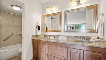 Combined shower/tub, hair dryer, towels, soap