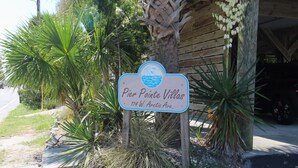 A sign for Pier Pointe Villas at 114 W. Arctic Ave. - Ocean Views & Central location~ Pier Point Villas B202 (Folly Beach)
