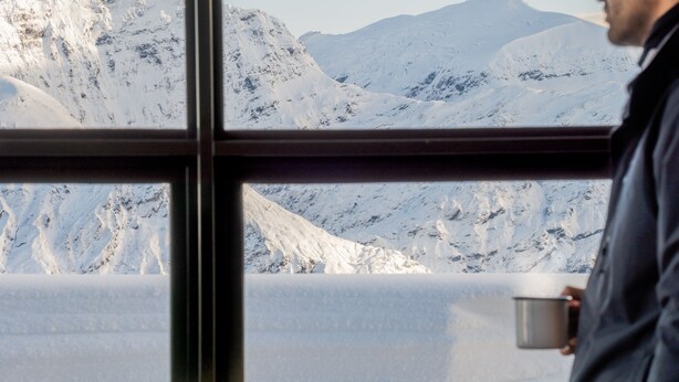 A window with a view of snow-covered mountains. - Exclusive Alpine Chalet overlooking Mt Aspiring National Park (Wanaka)