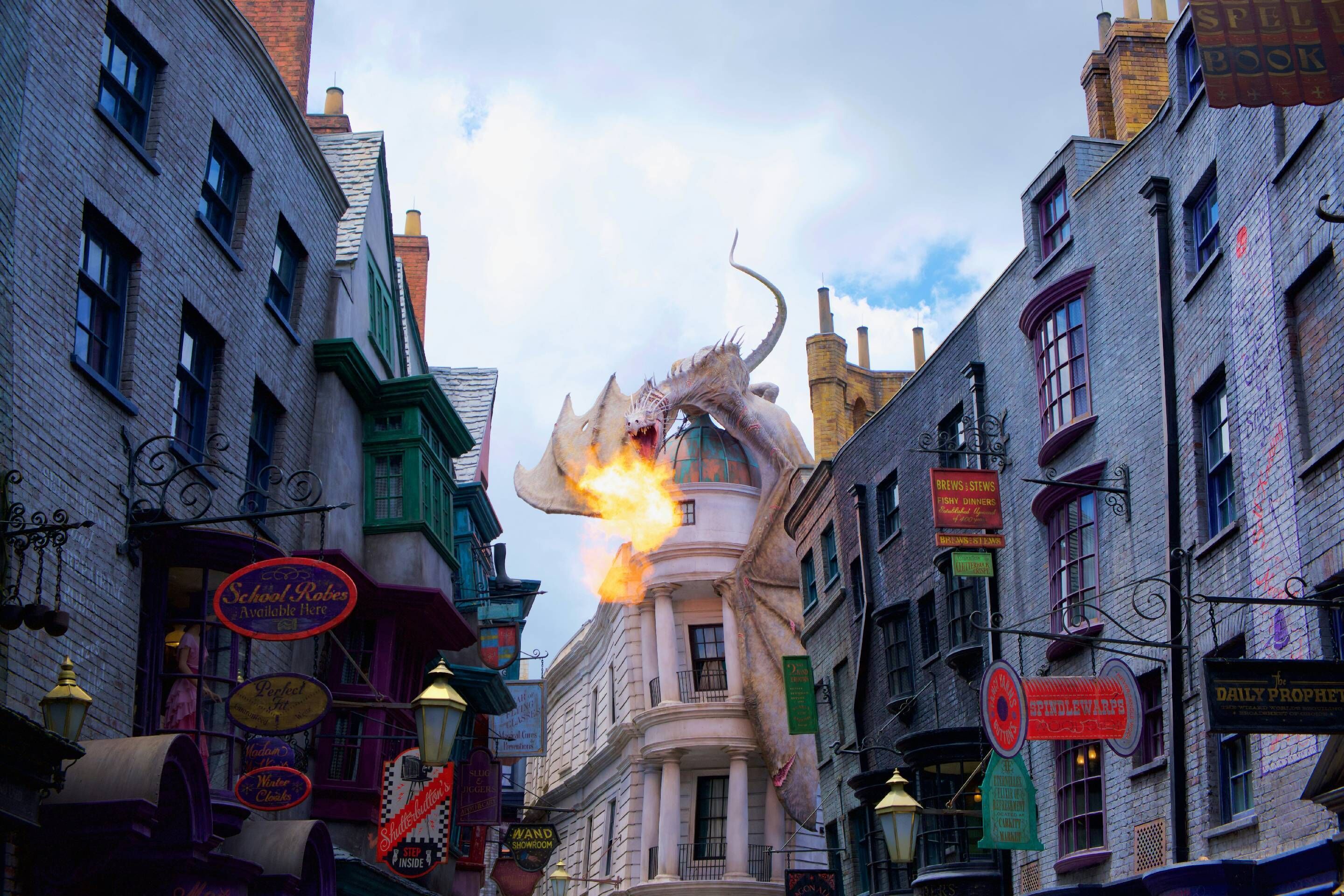 A street scene with a dragon in the center, surrounded by buildings with various signs and shop fronts.