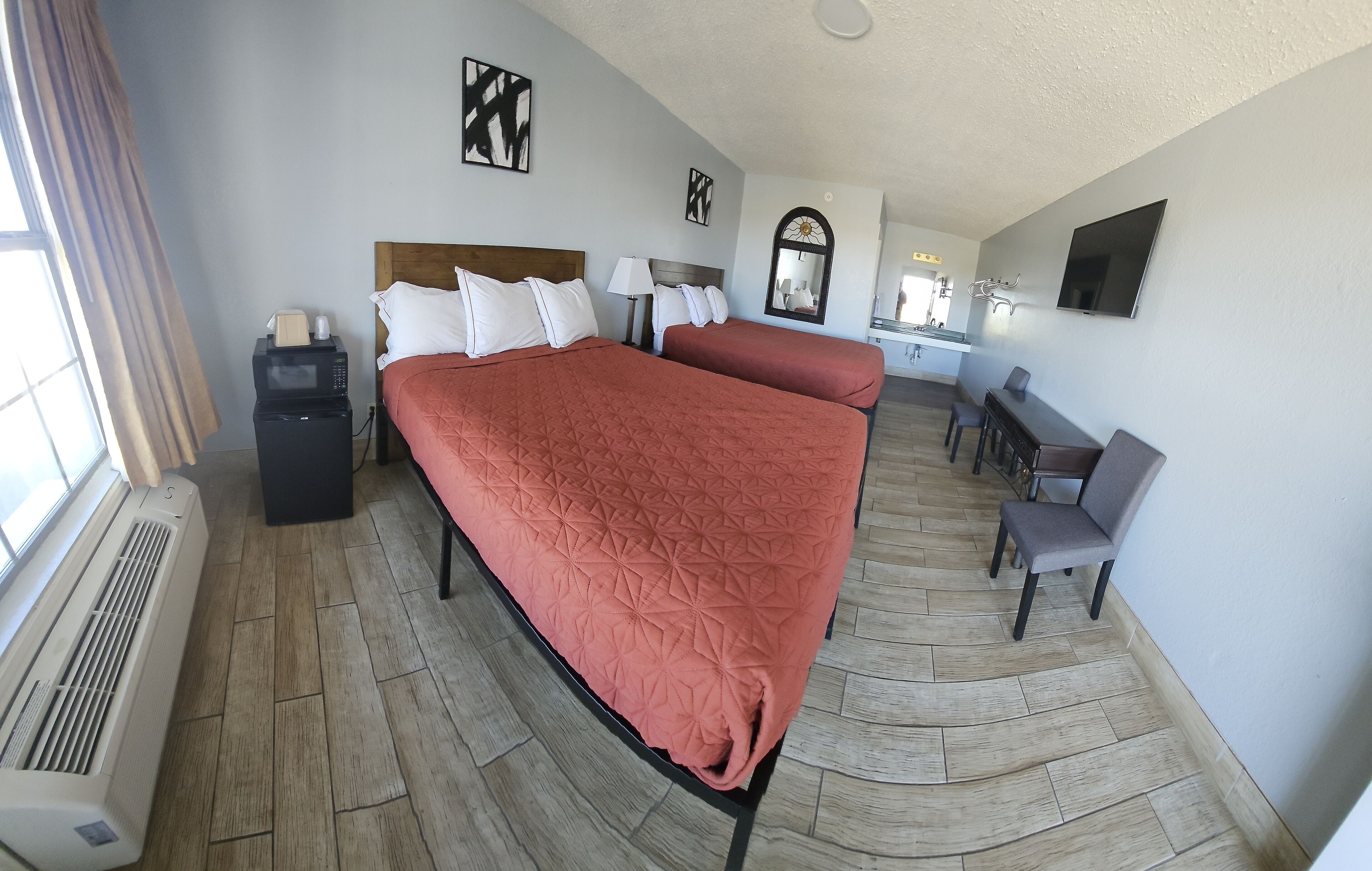 Pillow-top beds, blackout curtains, soundproofing, free WiFi