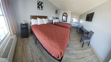 Pillow-top beds, blackout curtains, soundproofing, free WiFi