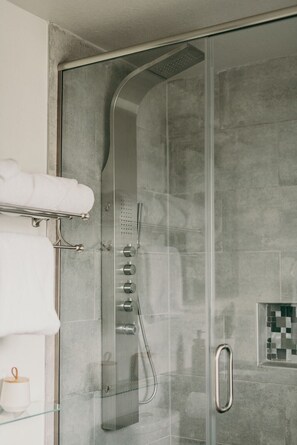 Combined shower/tub, hair dryer, towels, soap